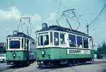 Straßenbahn Reutlingen__Tw 54 [ME 1953] auf Linie 3 nach Altenburg und Tw 51 [ME 1928] auf Linie 4 zum Karlsplatz,  in Orschel-Hagen am Abzweig der Linie 4 in die Trabantenstadt Orschel