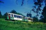 Straßenbahn Reutlingen__Die Straßenbahn in Reutlingen verkehrte das letzte Mal (auf den Linien 1 und 2) am 19. Oktober 1974. Drei-Wagenzug zwischen Südbhf. und Eningen. Offene Bw-Tür ohne Sommergitter bei voller Fahrt, sehr erfrischend !__05-09-1974