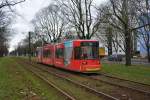 Am 10.01.2015 fährt diese Straßenbahn der BVG (GT6N) auf der Linie M13 zum Virchow-Klinikum, Aufgenommen in Berlin Osram-Höfe.