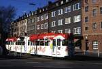 Dortmund Tw 90 biegt aus der Beurhausstrae kommend in die Hansastrae Richtung Stadtzentrum ein, 13.02.1988.