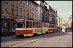 Tatra Tram Wagen 408 und ein weiteres unbekanntes Fahrzeug sind hier in der Innenstadt von Erfurt am 21.11.1990 auf der Linie 5 unterwegs.