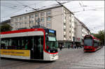 Streckendokumentation zweite Nord-Süd-Strecke in Freiburg - 

Über dieses Gleiskreuz verkehren alle Freiburger Straßenbahnen. Die Ost-West-Strecke ist hier zwischen den Haltestellen Rathaus im Stühlinger und Bertoldsbrunnen die Stammstrecke für die Linien 1 bis 4. Der Combino Advanced ist auf der Linie 3 unterwegs, der GT8Z auf der neuen Linie 5. Ein Gleisverbindung gibt es von Süden her von der Linie 5 nach Osten in Richtung Bertoldsbrunnen, rechts im Bild erkennbar.

07.10.2019 (M)