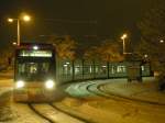 Noch ein Winterbild aus Mannheim. Wagen 1042 (frher RHB) wartet am 20.12.2010 an der Endhaltestelle Rheinau auf die Abfahrt um 19:02 Uhr, fotografiert um 19:00 Uhr. 