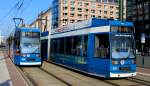 Rostock RSAG SL 5 (DÜWAG/DWA-6NGTWDE 688) / SL 1 (DÜWAG/DWA-6NGTWDE 674) Lange Strasse / Hst. Kröpeliner Tor am 15. Juli 2013.