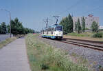 Schwerin NVS SL 4 (Tatra T3DC1 115 + T3DC2 215) Ludwigsluster Chaussee am 12. Juli 1994. - Scan eines Farbnegativs. Film: Scotch 200. Kamera: Minolta XG-1.