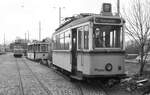 SSB Stuttgart__Gartenschau-TW (GS) 854 [Uerdingen 1939] mit T2-Rest (756?) und Schleiflok 2005 im Bf S-Möhringen auf den Schrottgleisen.__04-1975