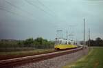 1983 lagen auf der Stuttgarter Straßenbahnlinie 3 zwischen Plieningen und Vaihingen schon Stadtbahngleise. Sowohl GT4 als auch Stadtbahnen wurden zu dieser Zeit wechselhaft eingesetzt, da Stadtbahnen noch viele Schwächen hatten. Der GT4 Zug fährt hier in Richtung der Station Landhaus.