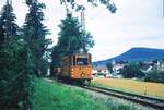 Straßenbahn Reutlingen__Die Straßenbahn in Reutlingen verkehrte das letzte Mal (auf den Linien 1 und 2) am 19. Oktober 1974. ATw 31 mit Anhänger nahe Eningen Richtung Südbhf. unterwegs. Blick über Eningen zum Gutenberg.  Nur ein Arbeitswagen , aber mit Geschichte ! [ME 1912 für die Straßenbahn Eßlingen; 1944 zur SSB als Tw 565; 1949 nach RT als Tw 31, spätestens ab 1966 als ATw in orange; 1974 Sammlung Pollitzer; 1980 ins DSMH e.V. Wehmingen; 1992 nach Zwickau,Umbau in Krakau zum  historischen  Bw 17. [Quelle: Homepage der Freunde des Nahverkehrs Zwickau e.V.] 
 __02-09-1974