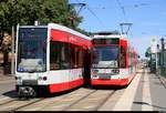 MGT-K (Bombardier Flexity Classic), Wagen 678 und Wagen 6??, der Halleschen Verkehrs-AG (HAVAG) als Linie 3 von Trotha nach Beesen treffen auf MGT6D, Wagen 606, der Halleschen Verkehrs-AG (HAVAG) als