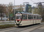 Gelenktriebwagen des Typs G4 aus dem Baujahr 1961 als Sonderfahrt von Rostock Platz der Jugend nach Rostock Kurt-Schumacher-Ring am 04.12.2022 in Höhe Rostock Steintor.