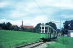 Straßenbahn Reutlingen__Die Straßenbahn in Reutlingen verkehrte das letzte Mal (auf den Linien 1 und 2) am 19. Oktober 1974. T2+B2 Dreiwagenzug auf Linie 1 kurz vorm Bf Eningen. Am Zugschluß Bw 49 [ME 1964].__02-09-1974