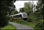 Am Stadtrand von Cuxhaven ist hier der EVB VT 648176 aus Bremerhaven am 17.8.2021 um 11.30 Uhr zum Zielbahnhof Cuxhaven unterwegs.