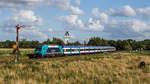 245 202 fährt mit einem RE bei Risum-Lindholm in Richtung Niebüll, aufgenommen am 13.