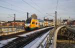 Hier 445 104-3 als RE2 (RE83971) von Cottbus nach Wismar, bei der Einfahrt am 1.2.2014 in Berlin Hbf.