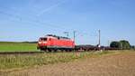 Nürnberger Leasing 120 127-6 (ex DB), vermietet an Bahnlogistik24, mit Niederbordwagenzug in Richtung Osnabrück (Melle, 27.08.2024).