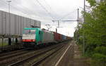 186 128 von ITL fährt mit einem Containerzug aus Duisburg-Rheinhausen-Ost(D) nach Decin-Vychod(CZ) bei Ausfahrt in Rheinhausen-Ost und fährt in Richtung Duisburg-Hochfeld-Süd.