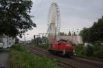 294 743-0 als FZT 54358 an der Libori-Kapelle und der jhrlichen Libori-Kirmes mit dem bekannten Riesenrad im Hintergrund, 27.07.2010. 