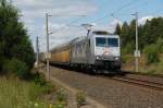 Mit einem Umleiter-ARS-Autozug ist die TXL  Kassel Huskies  185 540-2 am 12.08.2012 bei Herbram-Wald sdwrts unterwegs.