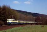 Bei Welschen-Ennest am 13.04.1990 mit 110 360 vor einem Schnellzug Hagen - Frankfurt.