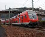 Der RE 9 (Rhein-Sieg-Express) Siegen-Kln-Aachen, kommt Steuerwagen voraus von Siegen, hier am 11.12.2011 in Betzdorf/Sieg.
