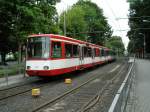 Eine Doppeltraktion aus Stadtbahnwagen B der dritten Generation der KVB bei der Ausfahrt aus der Haltestelle  Marienburg  in Kln als Zug der Linie 16 (Rheinuferbahn) nach Niehl am 14.06.2004.