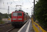 Ein Nachschuss von der 111 122 DB schiebt den RE4 aus Aachen-Hbf nach Dortmund-Hbf und kommt aus Richtung Aachen-West,Laurensberg,Richterich, und fährt durch Kohlscheid in Richtung