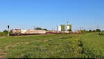 Leider in der falschen Richtung, aber dennoch ein Foto wert war mir der täglich verkehrende  Bertschi-Zug  von Ruhland nach Ludwigshafen BASF mit Zwischenstopp in den Buna-Werken (Kraftwerk