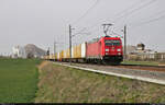 185 241-7 unterwegs mit DHL-Paketen in Teutschenthal Richtung Halle (Saale).