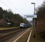 Der Südwest-Express Als RE1 Aus Koblenz-Hbf nach Mannheim-Hbf kommt durch Sehlem aus Richtung Koblenz und fährt in Richtung Trier.
Bei Wolken am Kalten Mittag vom 16.2.2015. 