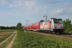 Mit ihrem RE (Freiburg (Brsg) Hbf - Basel Bad Bf) fuhr am frühen Abend des 19.05.2020 die Freiburger 146 227-4  Bahnprojekt Stuttgart-Ulm  bei Buggingen über die KBS 702 durchs Rheintal in