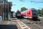 185 594-9 mit einem KLV-Zug gen Norden am Vormittag des 15.08.13 im Bahnhof Orschweier.
