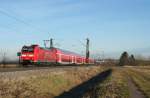 146 113-6 mit einem RE von Offenburg nach Basel Bad. Bf am Morgen des 31.12.13 bei Hgelheim.