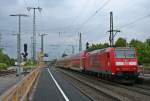 146 114-4 mit einem RE von Schliengen nach Offenburg am Vormittag des 18.04.14 beim Verlassen des Bahnhof Mllheim (Baden).