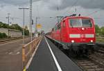 111 061 mit einer RB von Offenburg nach Schliengen am 25.04.14 beim Verlassen des Bahnhof Mllheim (Baden).