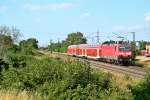 143 364-8 mit der HVZ-RB von Neuenburg (Baden) nach Freiburg (Breisgau) Hbf am Abend des 25.06.14 sdlich Von Buggingen.