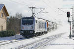 05. Januar 2017, die Railpool-Lok 187 313 befördert einen Kesselwagenzug in Richtung Saalfeld durch den Haltepunkt Gundelsdorf. 