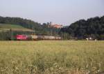 140 535-6 ist am 27. Juni 2011 mit dem CSQ 49451 (Freilassing - Zary) auf der Frankenwaldbahn bei Kronach unterwegs.