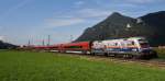 Die ``Polizei-Lok`` 1116 250-2 der ÖBB schiebt am 16.9.2014 den Railjet 869 von Innsbruck nach Wien West. Hier kurz nach dem BÜ bei Niederaudorf.