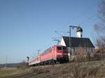 Am 15.03.2012 schob 111 022 ihre RB in Richtung Murnau. Die Aufnahme entstand bei Waichs (Mittenwaldbahn).