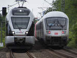 Begegnung von Abellio ET 23 2102 und einem IC unterwegs Richtung Bochum-Hauptbahnhof. (Wattenscheid, Mai 2020)
