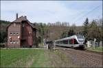 ET22xxx und ET23006 fahren als ABR99647, (RE16  Ruhr-Sieg-Express ) am ehemaligen Bahnwrterhaus vorbei und werden in wenigen Minuten Werdohl erreichen. (27.04.2008)
