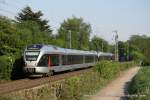 RE16 in Richtung Essen Hbf fhrt am 25. April 2011 um 18:21 Uhr durch Bochum Hntrop