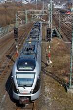 ET 23 001(3-teiliger Stadler Flirt) der Abellio Rail NRW kommt am 24.03.2012 von der Ruhr an die Sieg, hier kurz vor der Entstation Hbf Siegen. Er fhrt die Strecke Essen-Hagen-Siegen (RE 16 Ruhr-Sieg-Express). 