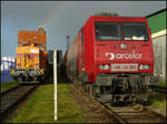 EKO 145-CL001 und eine V100 von AEH ruhen sich am 20.11.2008 im Stralsunder Nordhafen unterm Regenbogen aus.