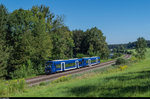 Am 8. August 2016 fahren die RegioShuttle Nr. 71 und 70 der Bodensee-Oberschwaben-Bahn bei Meckenbeuren in Richtung Friedrichshafen.