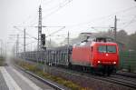 145-CL 014 (145 092-3) im Dienst fr Crossrail mit einem leeren Autotransportzug bei starkem Regenfall in Rathenow. 25.09.2010