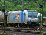 185 676-4 von Railpool im Dienst fr die EVB am 11.07.2012 vor einem Getreidezug in Aachen West.