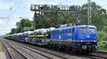 Eisenbahngesellschaft Potsdam mbH, Potsdam (EGP) mit ihrer  140 824-4  (NVR:  91 80 6140 824-4 D-EGP ) und einem PKW-Transportzug am 06.07.23 Höhe Bahnhof Dedensen-Gümmer.