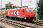 HGK 2056 (185 588-1,  MEV Independent Railway Services, HSM Gruppe ) abfahrbereit nach Spandau (Hennigsdorf, 20.07.2009)