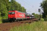 185 585-7 der HGK mit offenen ARS-Autotransportwagen in Fahrtrichtung Süden.